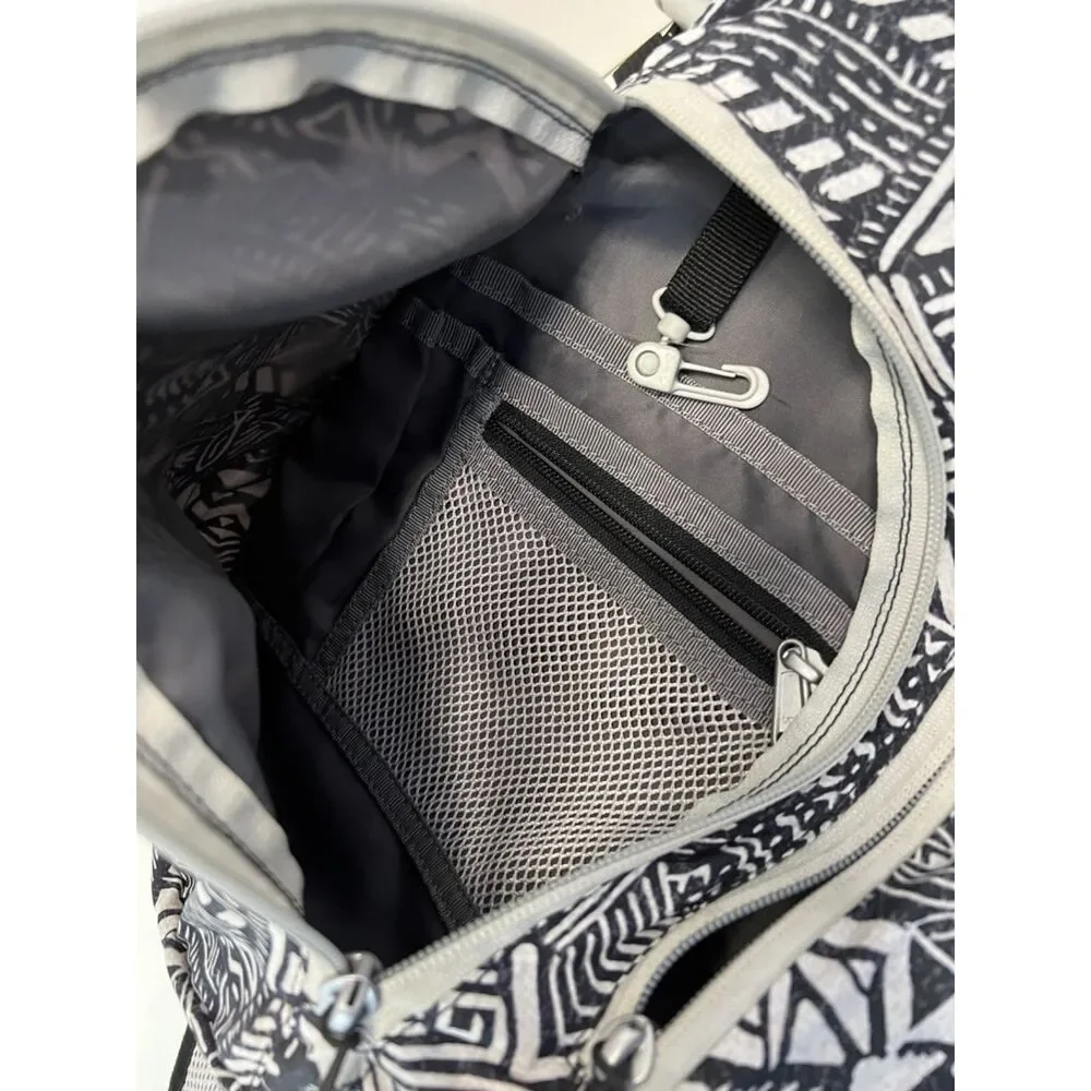 Eddie Bauer Ripstop 8L Sling Pack with a black and white tribal pattern